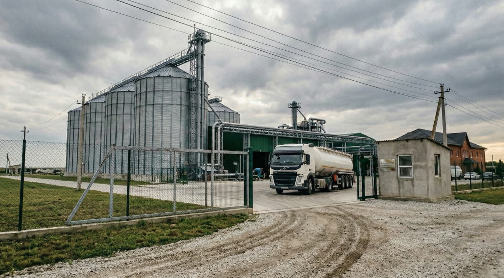 ALIONEXAGRO SRL facility entrance with tanker truck and grain silos